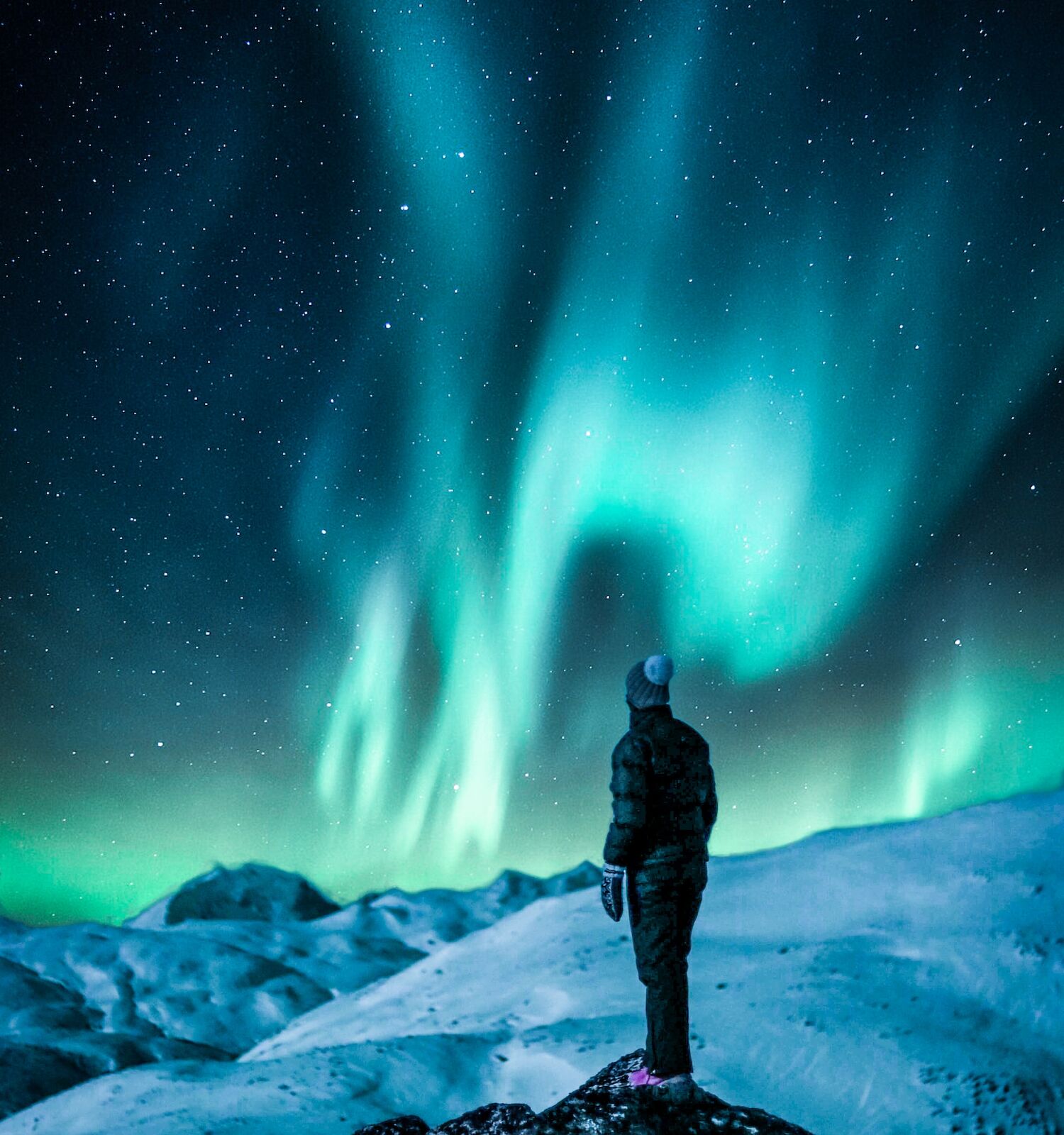 Traveler admiring the Northern Lights