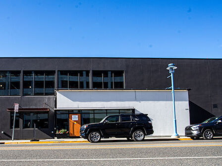 Cars parked in front of the Aviator Hotel building